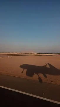The shadow of an aircraft about to touch down at Sharm el Sheikh, Egypt Stock Photos