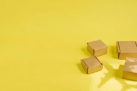 Shadow Airplane and stack of cardboard boxes. concept of air cargo and parcel 스톡 사진