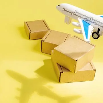 Shadow Airplane and stack of cardboard boxes. concept of air cargo and parcel 写真素材