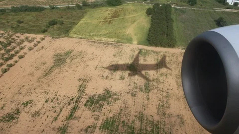 Shadow of an airplane on the ground during landing Video stock 90211468