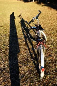Shadow and bicycle Stock Photos