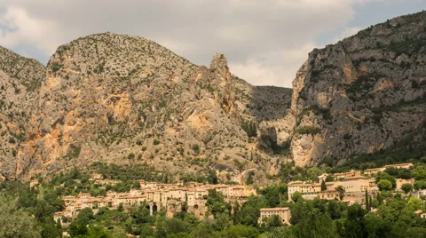 Shadow and clouds passing above Moustiers St. Marie village 4K Stock Footage 53514121