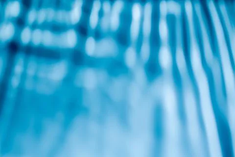 Shadow and light caustic effect on blue wall Stock Illustration