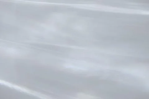 Shadow and light caustic effect on a white wall Stock Photos