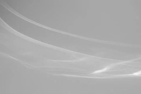 Shadow and light caustic effect on a white wall Stock Photos