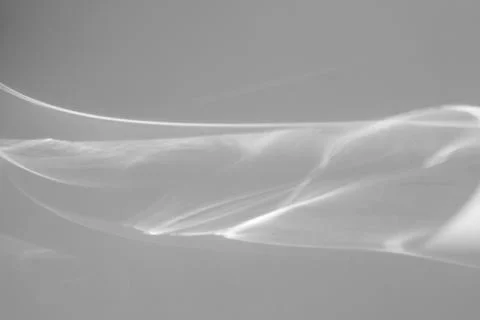 Shadow and light caustic effect on a white wall Stock Photos