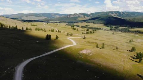 Shadow and light, clouds covers the sky, shadow makes ground dark, light changes Stock Footage 143561865