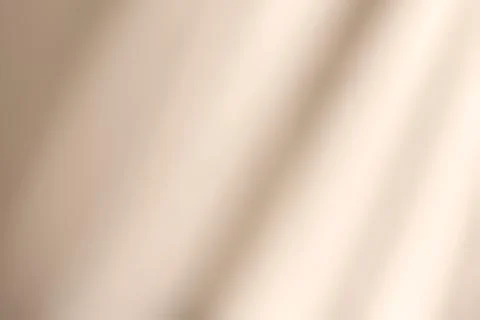 Shadow and light on solid beige wall texture background Illustrazione stock