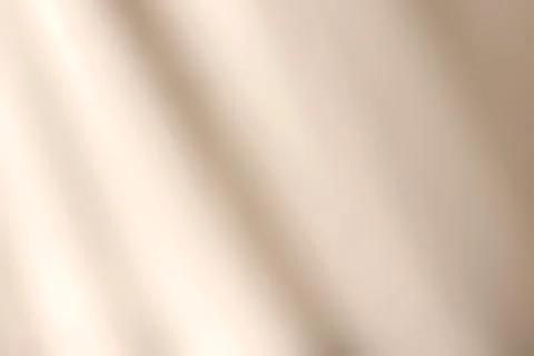 Shadow and light on solid beige wall texture background Foto stock