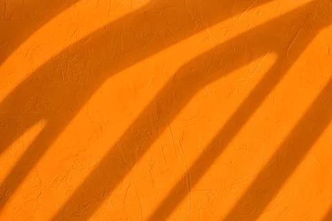 Shadow and light on solid orange wall texture background Stock Illustration