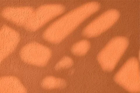 Shadow and light on solid orange wall texture background Stock Photos