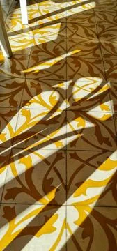 Shadow and Light on Tile Floor Stock Photos