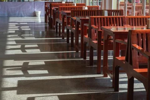 Shadow and a table in a dining room Stock Photos
