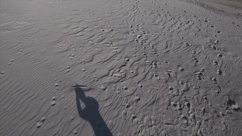 Shadow on the beach - 4K footage Stock Footage 84790552