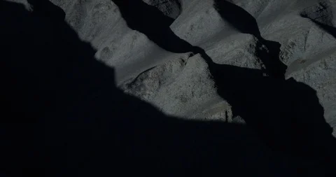 Shadow of biker on rocky mountain Stock Footage 108722530