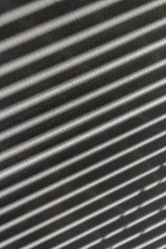 The shadow of the blinds on the wall Stock Photos