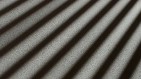 The shadow from the blinds on the white wall Stock Footage 210215081