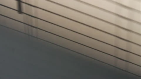 The shadow from the blinds on the white wall. Stock Footage 210818718