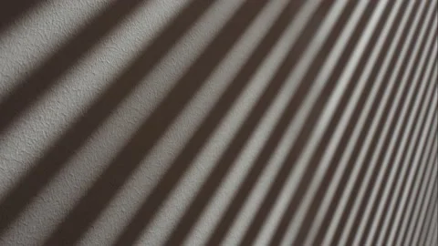 The shadow from the blinds on the white wall. Stock Footage 213531266