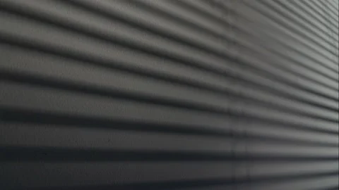 Shadow of blinds windows on the white wall in, time-lapse. Video stock 201078212
