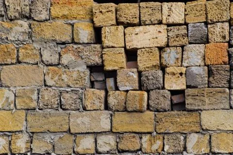 Shadow from the blocks of limestone shell. Wall texture background Stock Photos