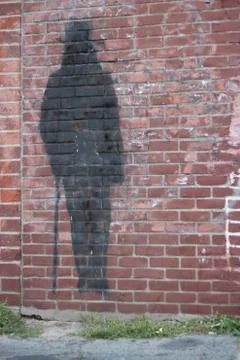 Shadow on a Brick Wall Stock Photos