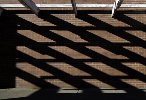 Shadow on bricks Stock Photos