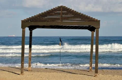 Shadow canopy on the beach Stock Photos