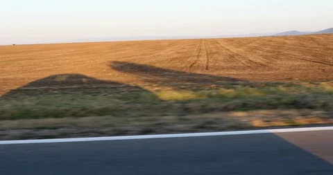 The shadow of the car while driving Видео 116178857