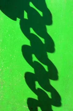Shadow of chain of anchored ship Stock Photos