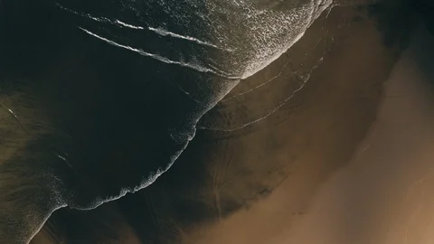 Shadow of a cloud passes over a New Zealand beach Video stock 123235803