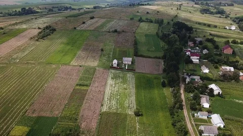 The shadow of the cloud runs across the small house Stock Footage 114651689
