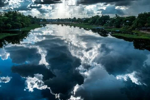 Shadow clouds in the river Stock Photos