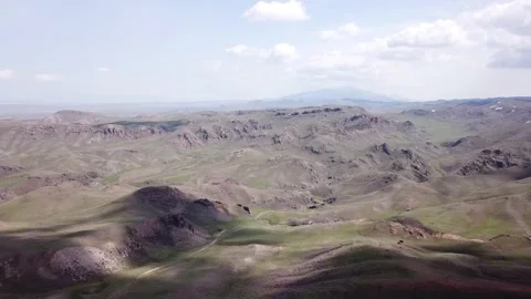 The shadow of the clouds runs over the green hills Video stock 152974785