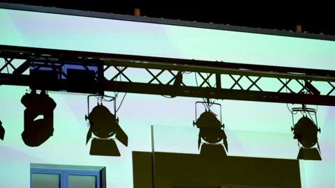 Shadow of concert lights on a wall Stock Footage 136905343