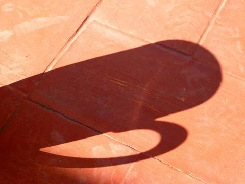 Shadow of a cup Stock Photos