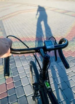 Shadow of a cyclist Stock Photos