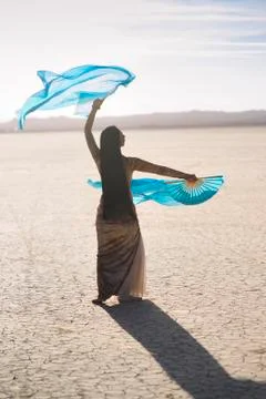 Shadow of Dancer Dancing in the Desert Stock Photos