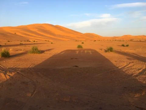 Shadow on desert Stock Photos