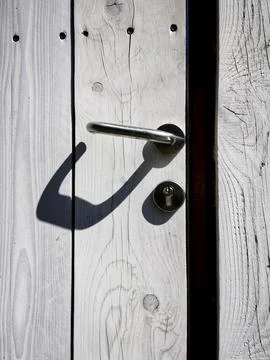 Shadow of a door handle Photos