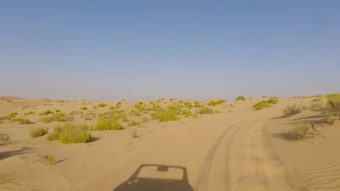Shadow Of A Dune Buggy Driving Fast In Sand Dunes In A Desert Landscape Of Abu Stock Footage 331000877