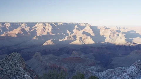 Shadow falling on the rock formations at Grand Canyon area Stock Footage 104115749