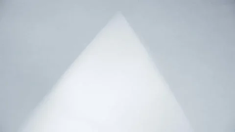 A shadow falling through a window onto a piece of paper. Stock Footage 284627003