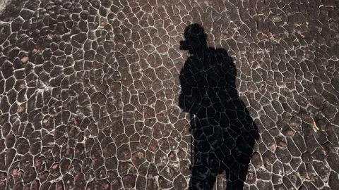 Shadow Of Female On Sun Crack Texture Big Rock Floor Stock Footage 296539099