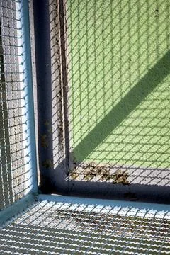 The Shadow Of The Fence Stock Photos