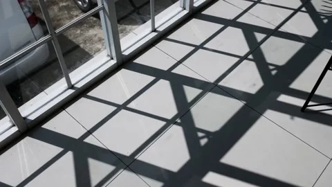 Shadow of frame window on floor Vídeos de archivo 205494966