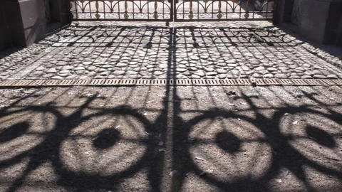 Shadow of gate at sunny day Stock Footage 73992427