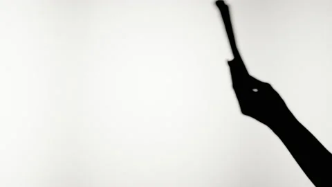 Shadow of giving money on white background. Silhouette of businessman receiving Stock Footage 169948552