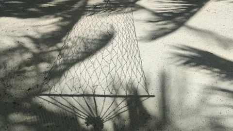The shadow of a hammock on the sand. Stock Footage 161902057