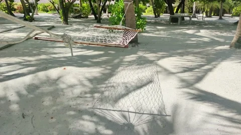 The shadow of a hammock on the sand. Stock Footage 169106029